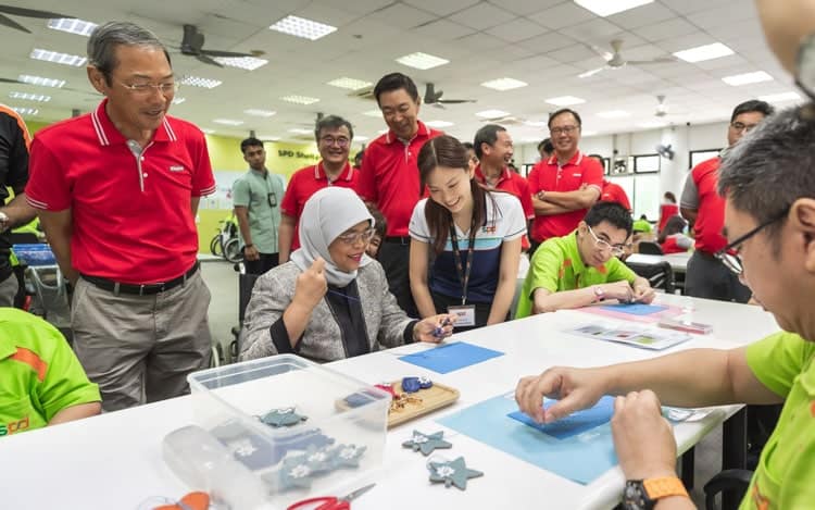 President Halimah Yacob toured the SPD Sheltered Workshop supported by Keppel and was briefed on how the sheltered workshop programme provides support to SPD trainees, maximising their potential. Through a new apprenticeship programme and Keppel's skills-based volunteerism, young leaders from Keppel will bring the Group’s diverse capabilities in areas such as engineering, workplace safety, business development and marketing to enhance the Sheltered Workshop.