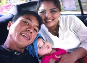 Mr Wong and Mdm Nooraini with their baby girl.