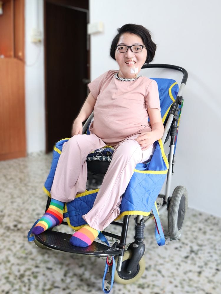 What you need to know about choosing a wheelchair 4 S P D S C M P client Jin Zhu in her pushchair.