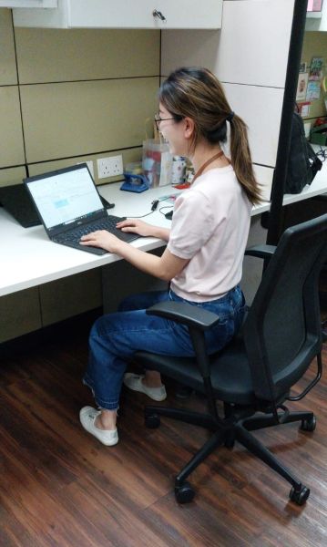 How SPD’s Early Intervention Teachers Relax and Recharge during the School Holidays 6 Jean at her desk working on her laptop