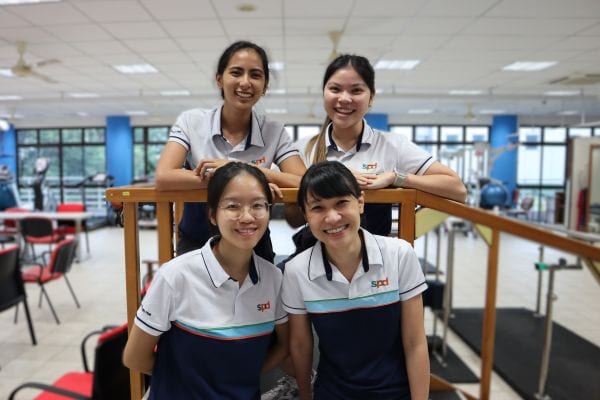 Pauline with 3 young therapists at the S P D Rehabilitation Centre