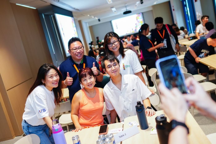 Building Worlds Together: How SPD and APB Singapore are Co-creating Inclusion 5 Mdm Goh and Dylan with A P B S volunteers and S P D staff