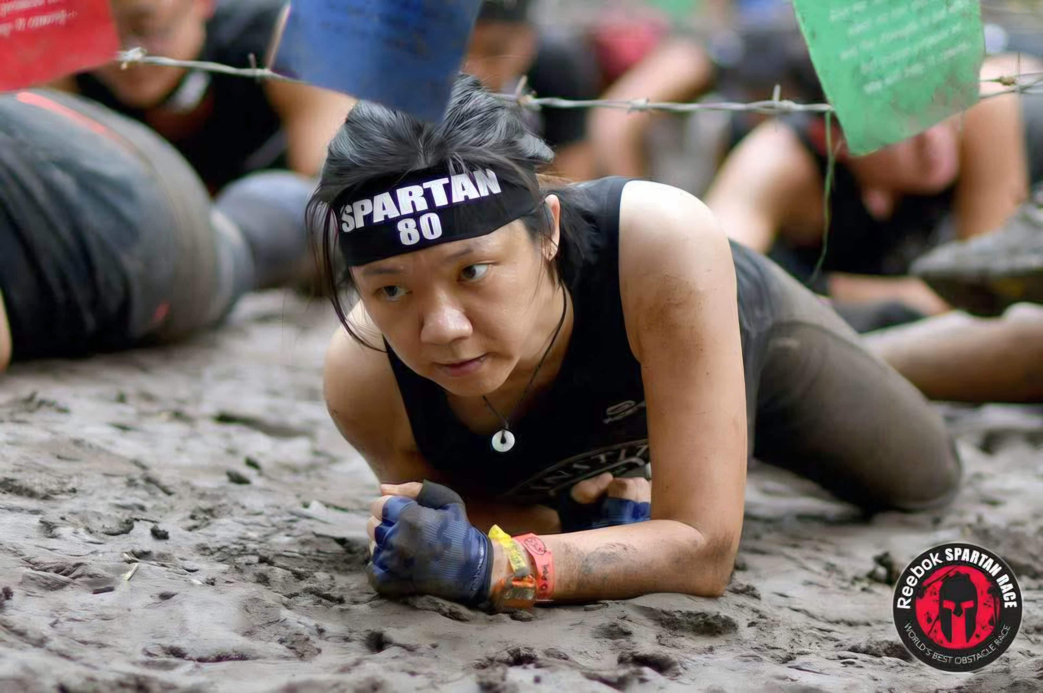 Where Purpose Found Me: Alexis' journey back to SPD 3 Alexis doing a leopard crawl in the mud at the Spartan Race