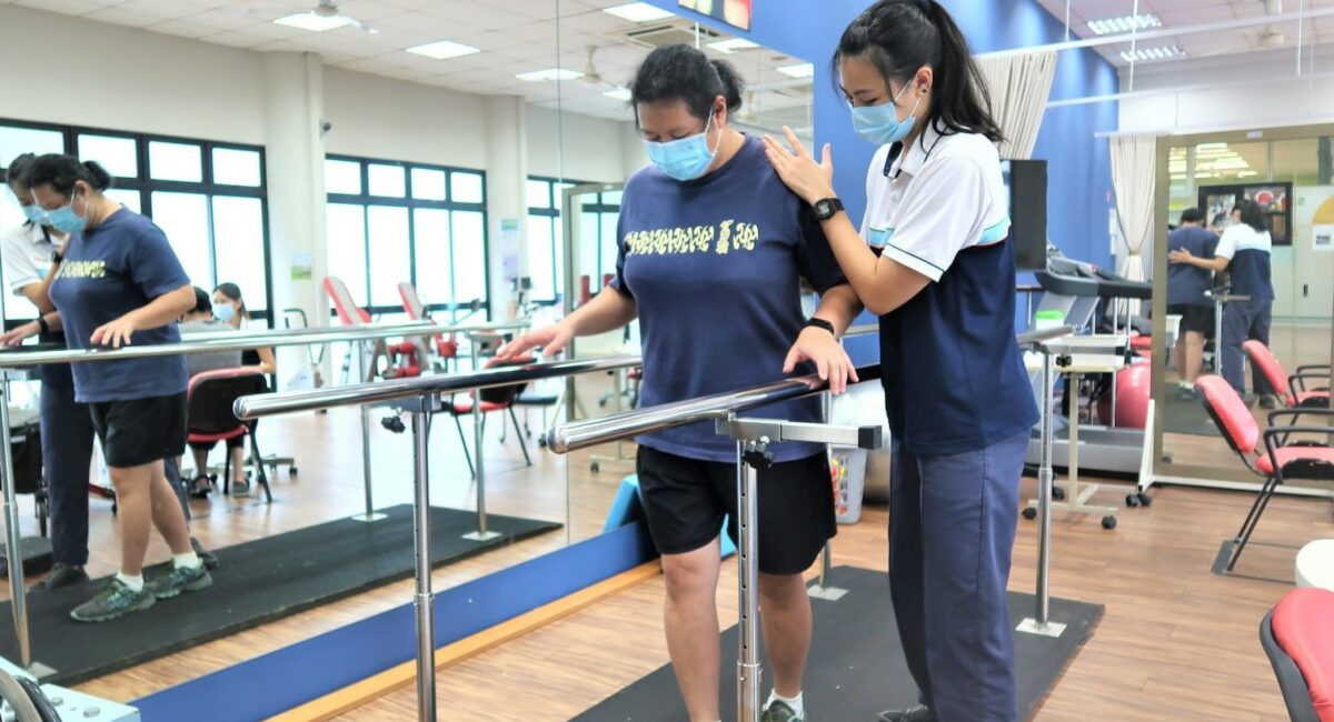 S P D professional working with a female client on her walking