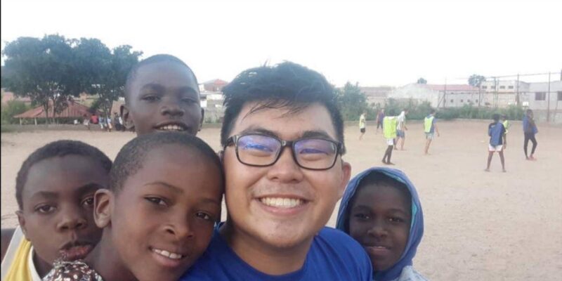 Elliot with 4 African children
