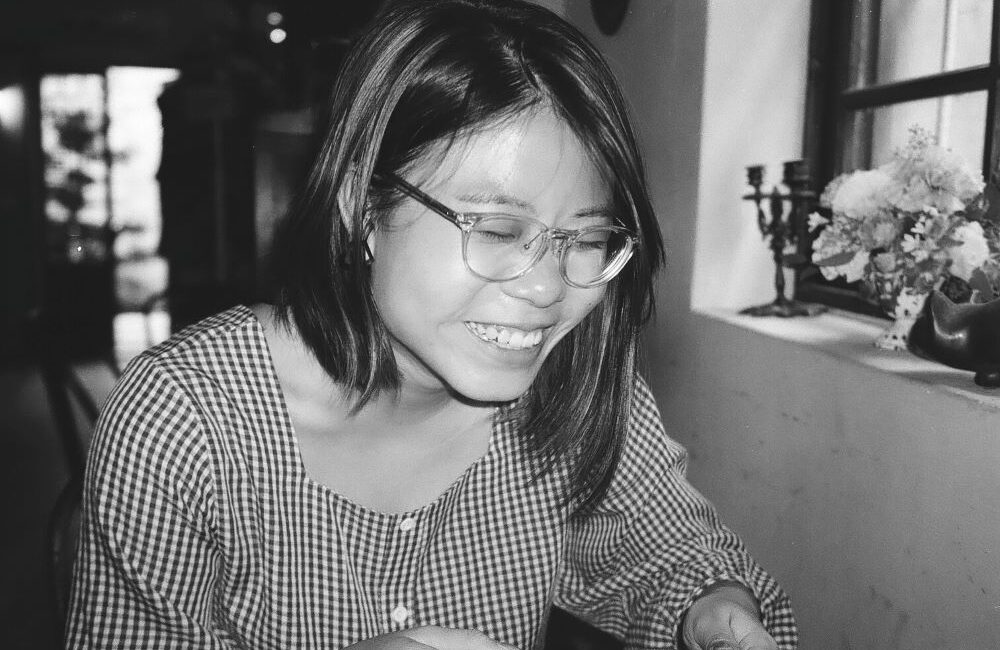 Social worker Xinyi smiling