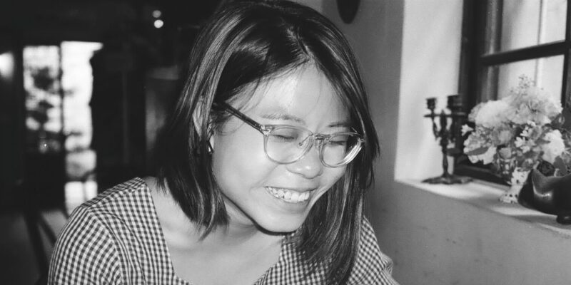 Social worker Xinyi smiling