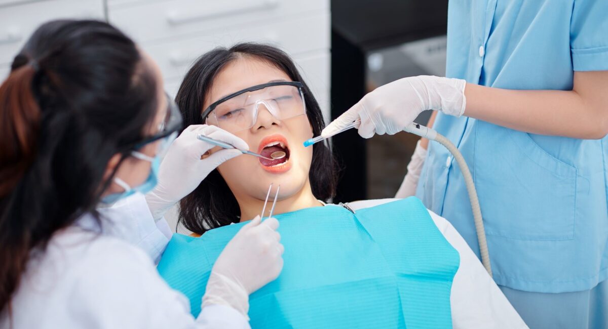 Woman receiving dental treatment
