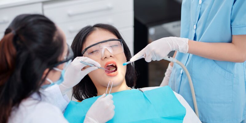 Woman receiving dental treatment