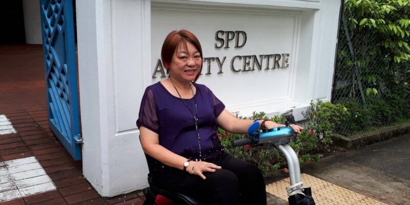Jane on her mobility scooter outside SPD Ability Centre