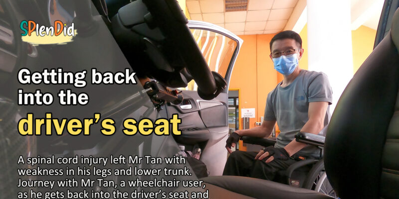 Mr Tan in his wheelchair looking into his car
