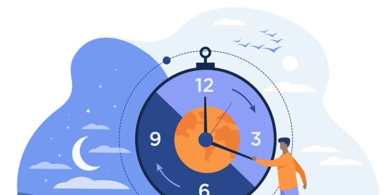 A man facing a clock