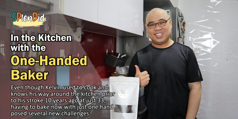 Kelvin smiling and giving a thumbs up, showing his packet of brownie brittles