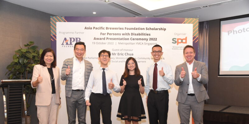 Group photo of scholarship recipients and guests at the ceremony
