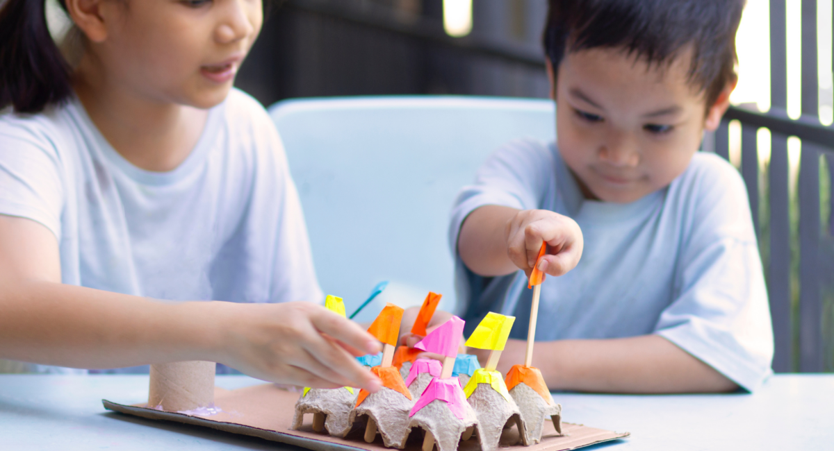 Two kids engaging in a colour-matching activity