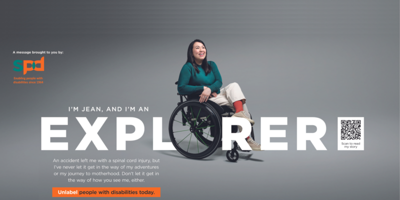 A woman on wheelchair smiling