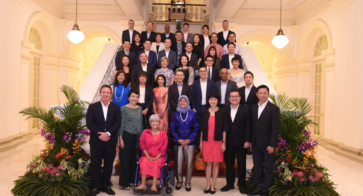 A group photo of S P D donors and President Halimah Yacob at the Istana