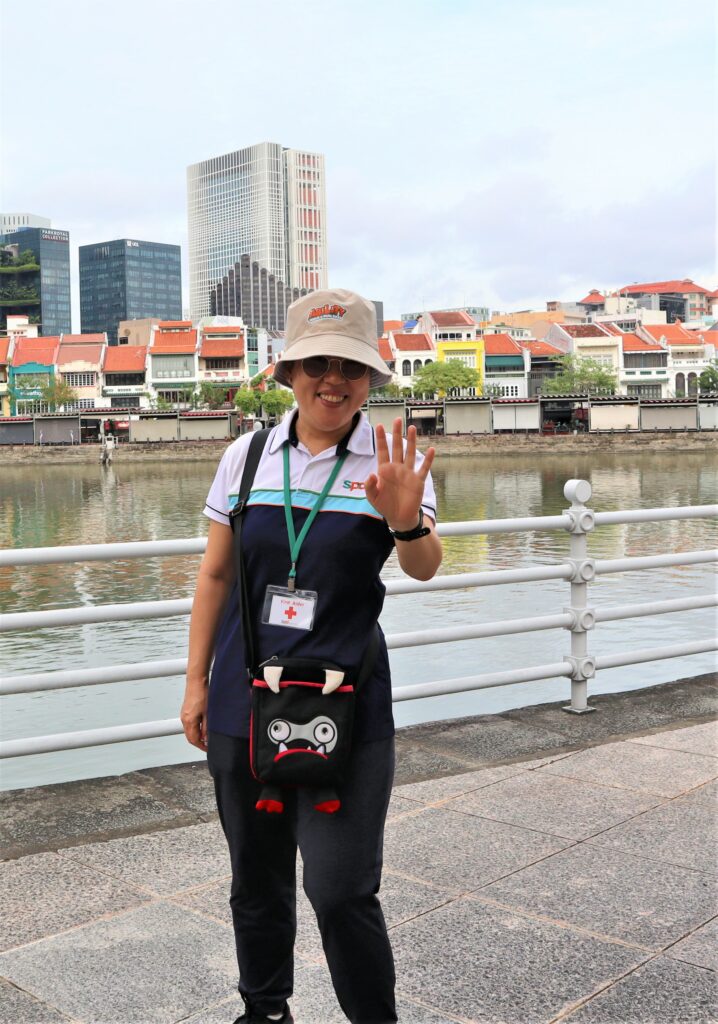 Ruimin waving and smiling for the camera
