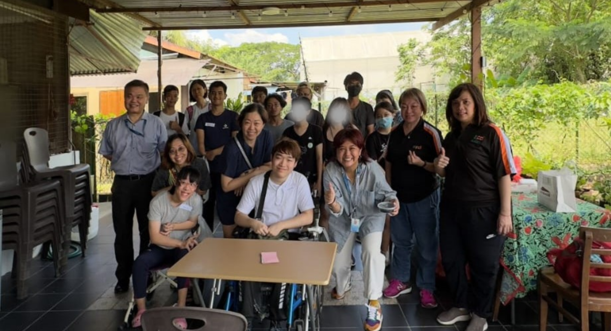 Bursary recipients taking a group photo after the outing at Green Up Singapore