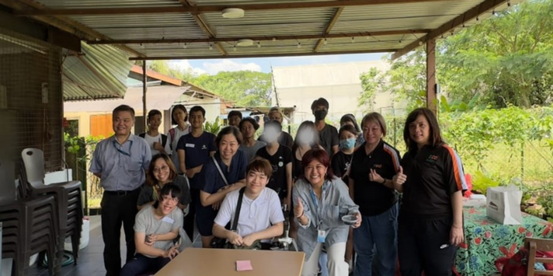 Bursary recipients taking a group photo after the outing at Green Up Singapore