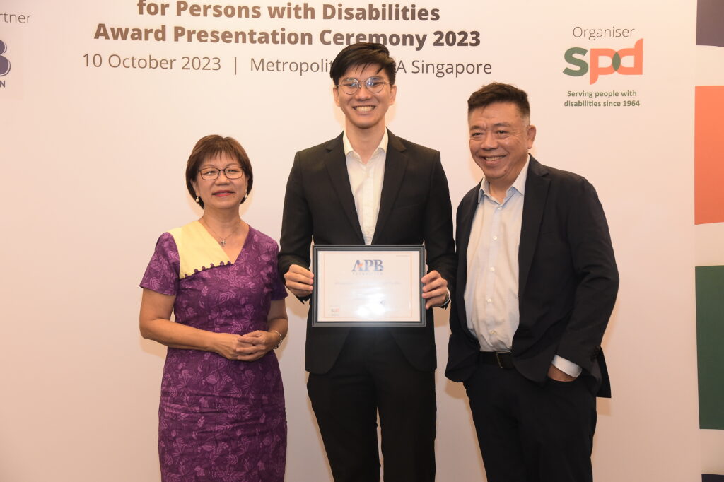 From left - GOH Ms Denise Phua, scholarship recipient Bjorn Ng, Chairman, Board of Trustees, APB Foundation Mr Kenneth Choo