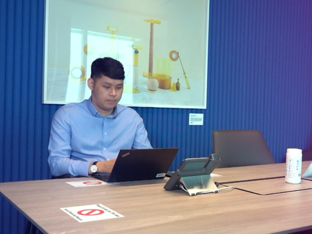 Alwyn at his desk working