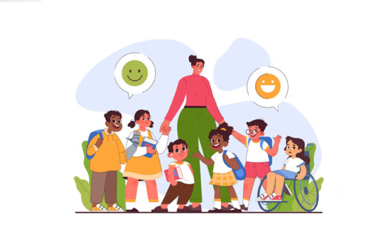 An adult standing amongst a group of children, of whom a girl is in a wheelchair and a boy is wearing a hearing aid