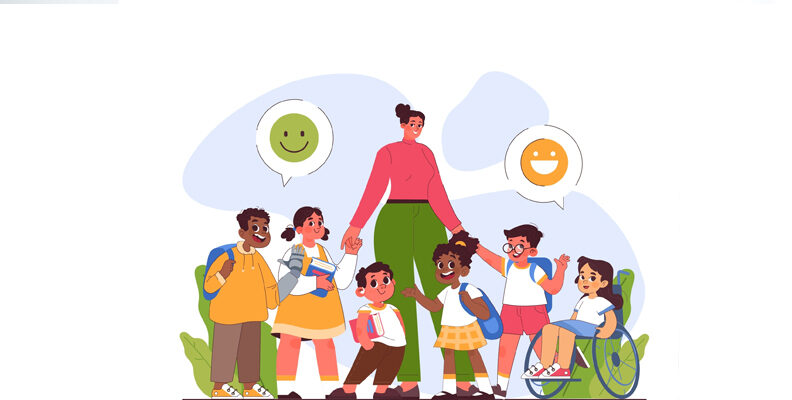 An adult standing amongst a group of children, of whom a girl is in a wheelchair and a boy is wearing a hearing aid