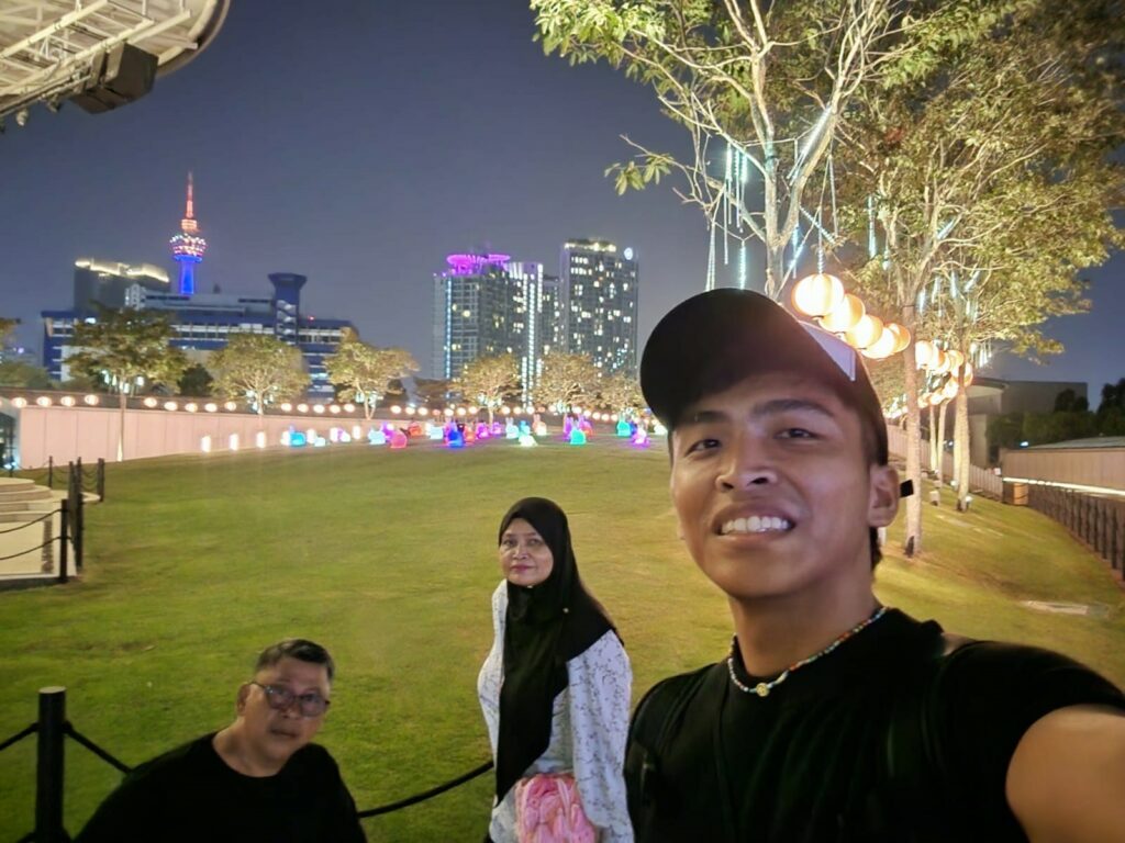 Sufian with his parents at the park
