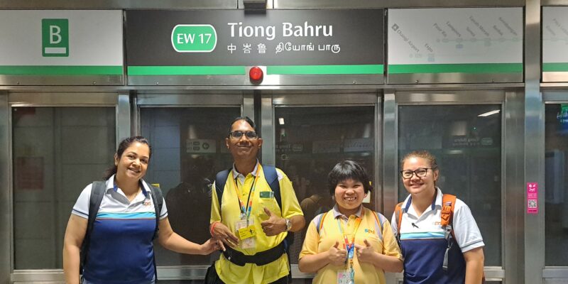 D W W clients and S P D D A C training officers at Tiong Bahru train station