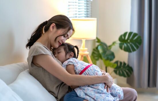 Mother with her sleeping child