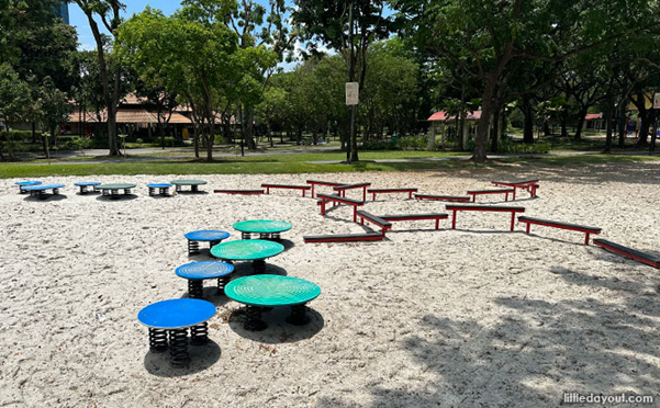 Balance beams and round steps at West Coast Park playground