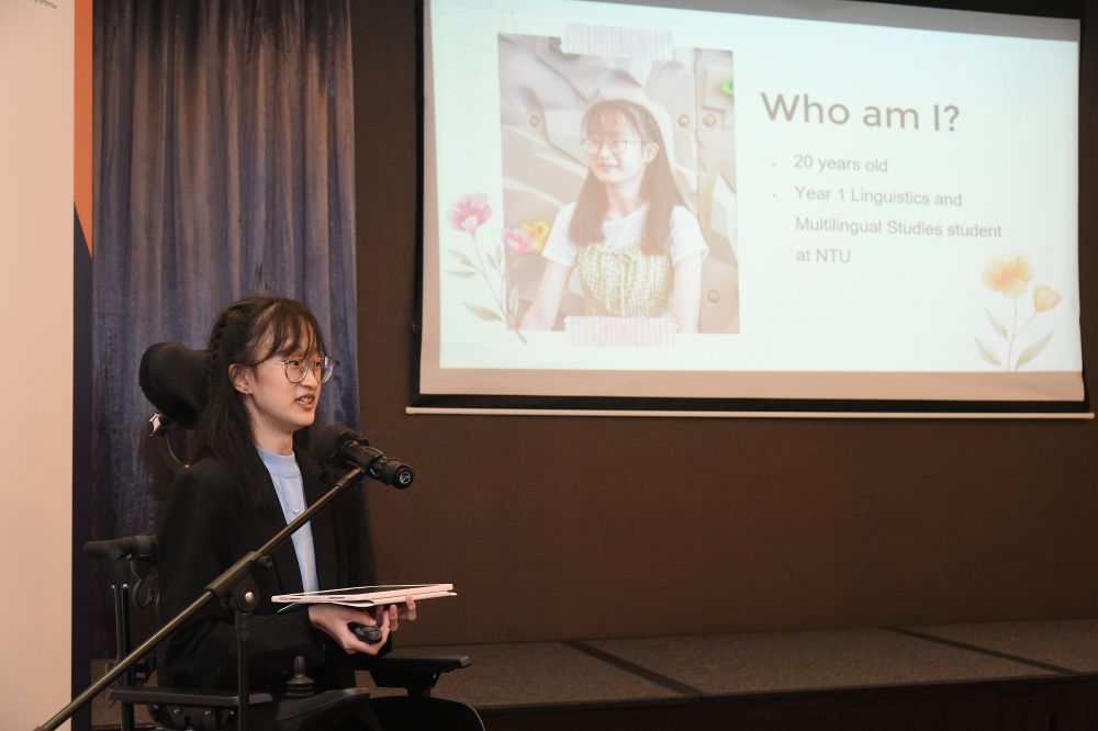 Raphella giving a presentation about herself