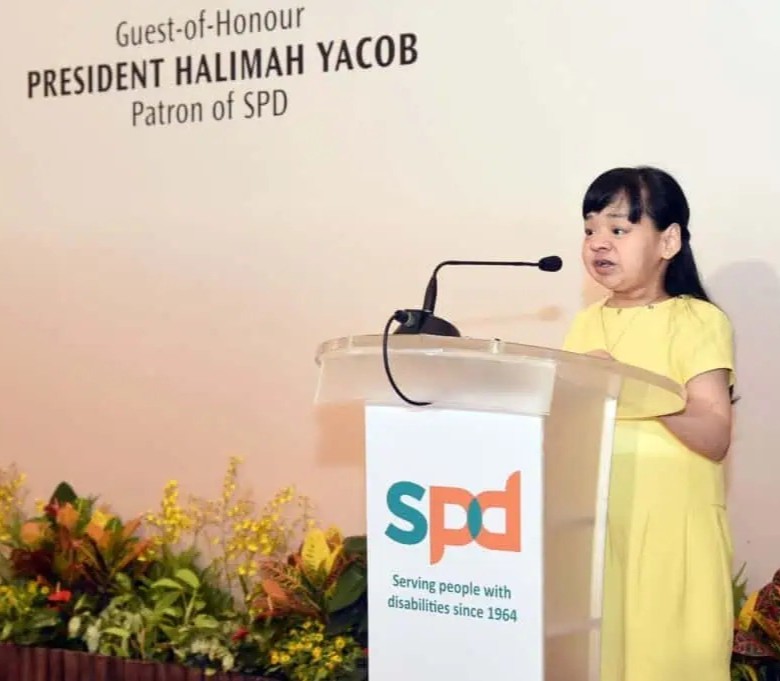 Pearl as the emcee of an S P D appreciation event at the Istana.