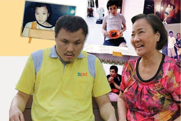 A caregiver with her son who is wearing the Day Activity Centre uniform, in the background is a collage of old photos of the client