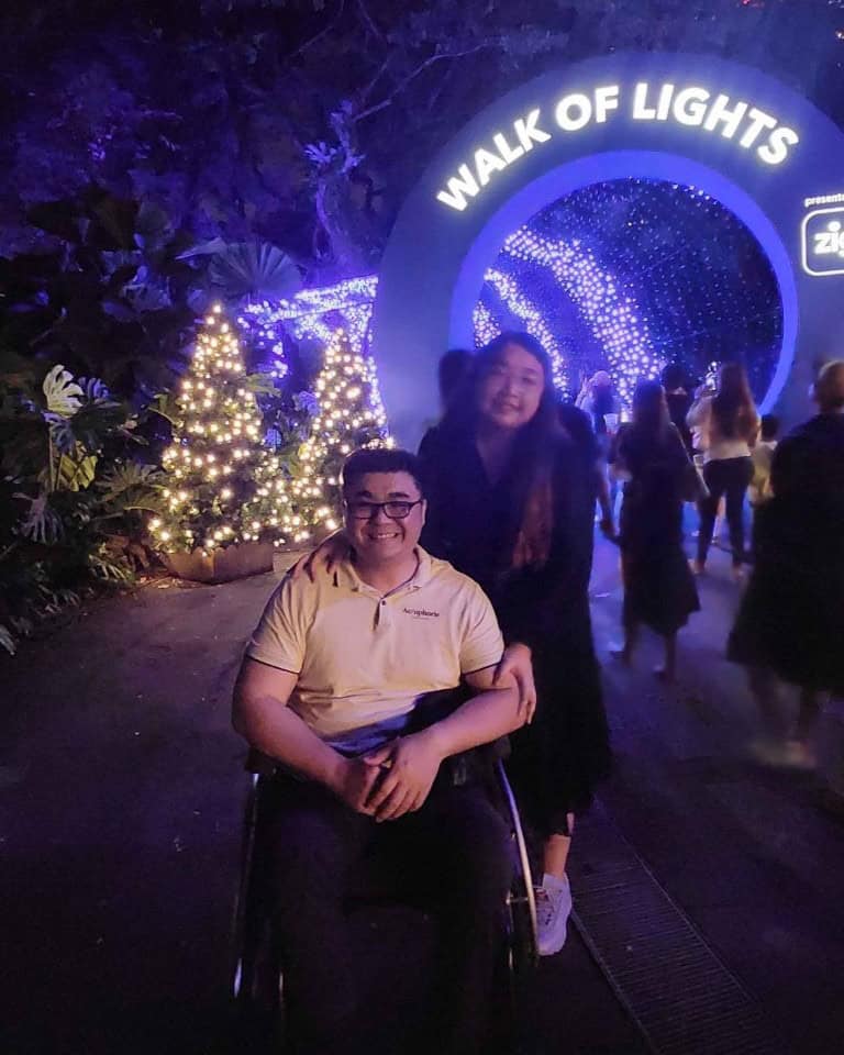 Kishon and his girlfriend at a Walk of Lights Christmas event