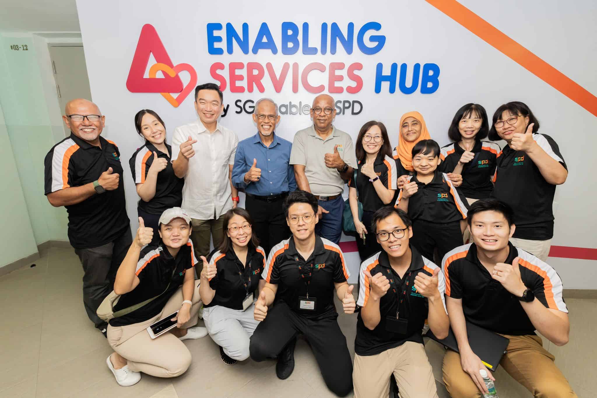 Group photo of the SPD ESH team with Minister Masagos Zulkifli and Senior Parliamentary Secretary Eric Chua at the opening launch.