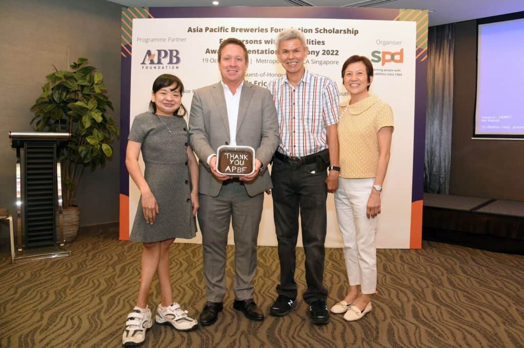 A group photo of Pearl and her family, together with A P B's Mr Andy Hewson