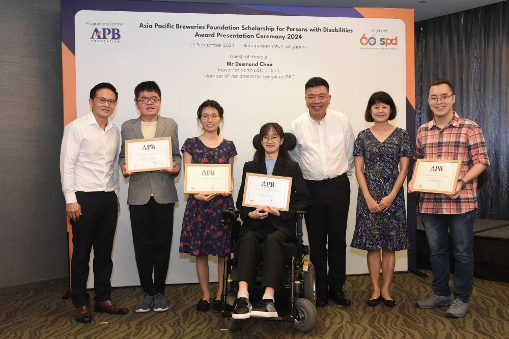 The 2024 A P B Foundation Scholarship recipient with the GOH, A P B Foundation representative and S P D representative