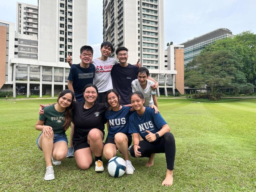 Eugene with 7 of his school mates after football in an open field