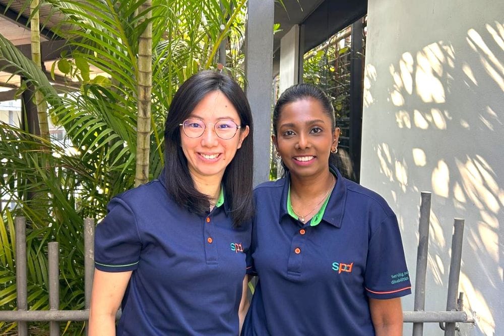 Rebecca and Andrea smiling in S P D uniforms