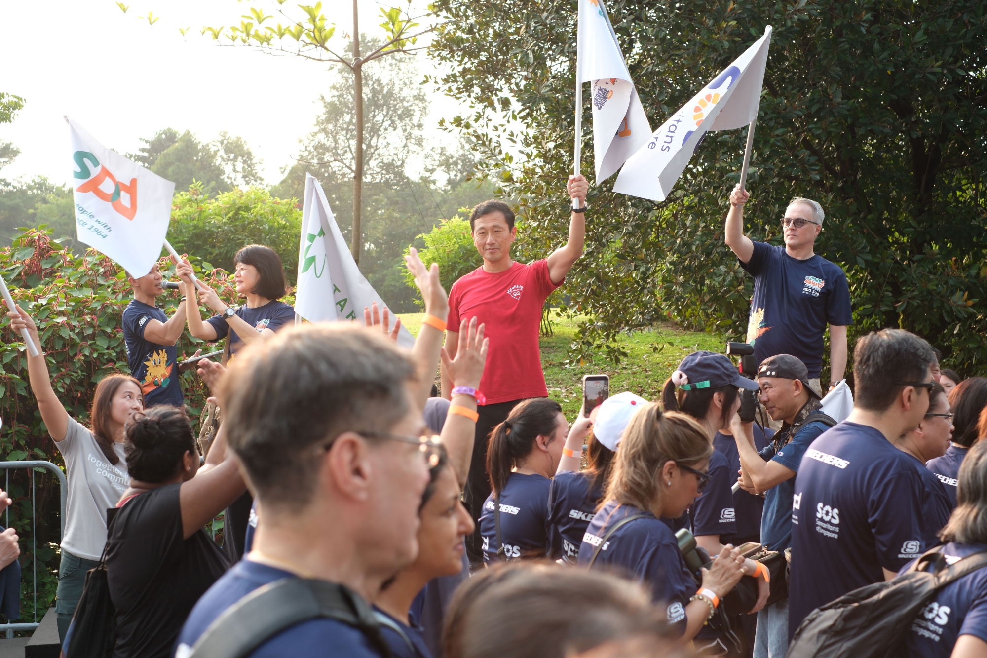 GOH Minister Ong Ye Kung flagging off the SparkAbility Walk