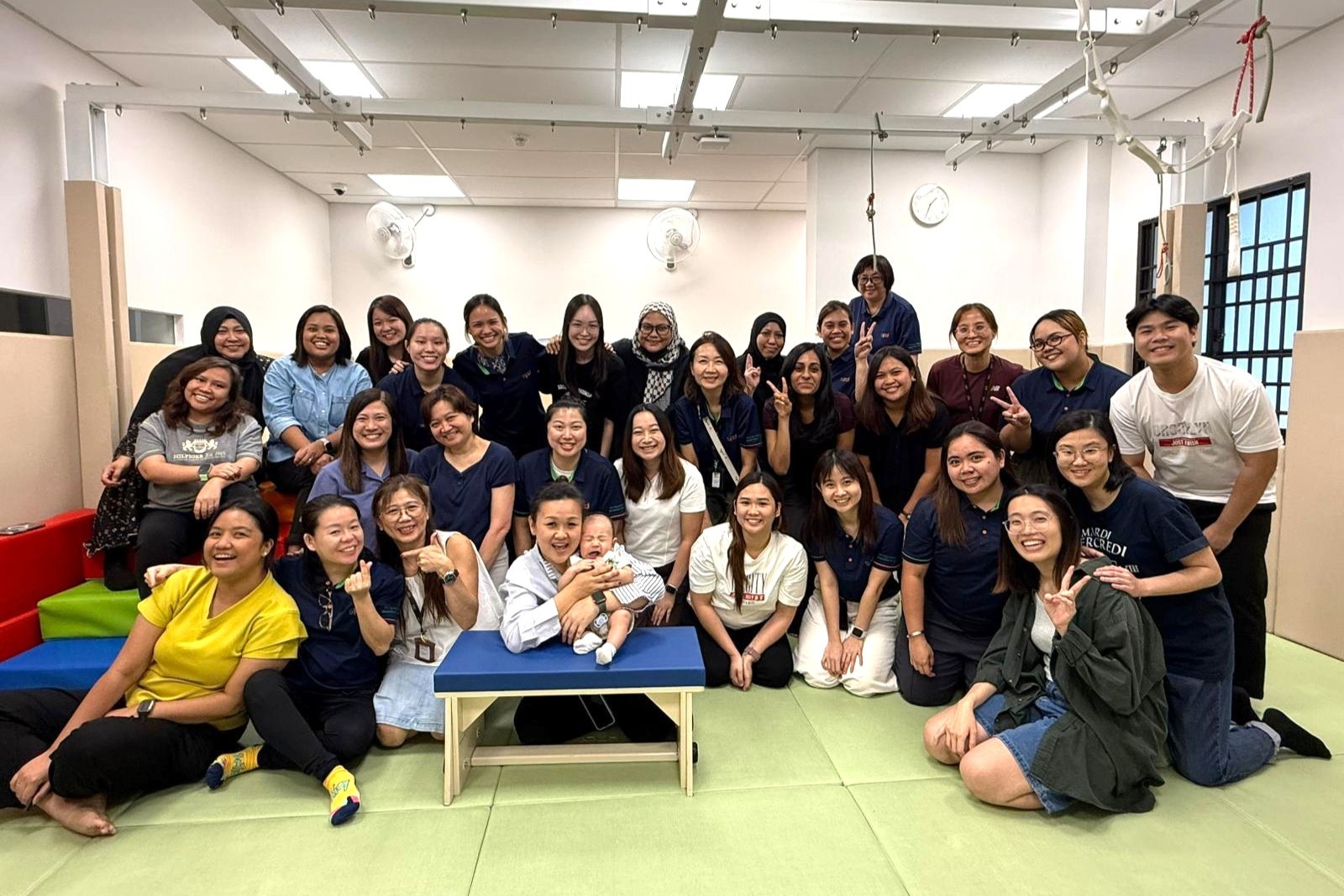 S P D Kembangan professionals at the occupational therapy gym