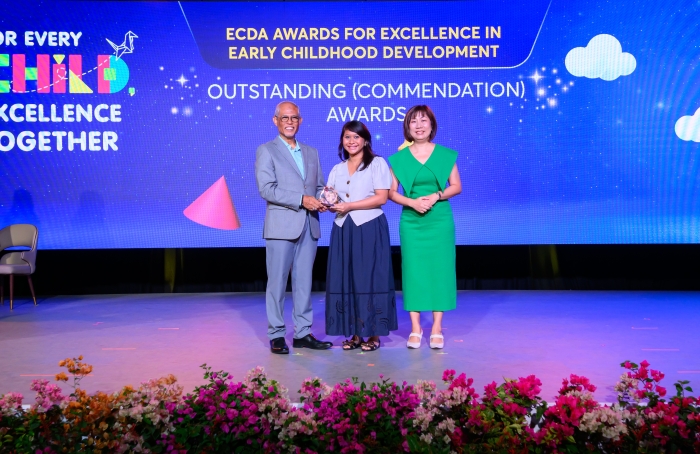 Assistant senior early intervention teacher Noor Hafidah receiving her award from Minister Masagos at the Early Childhood Celebrations 2026.